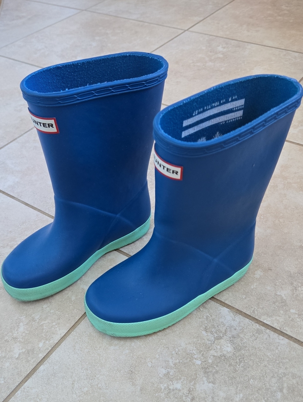 Hunter Kids Blue Rain Boots with Mint Green Sole